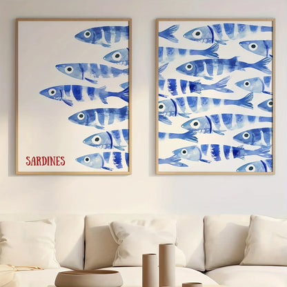Two framed artworks of blue striped fish on a wall above a sofa.