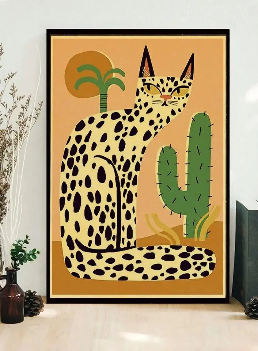 Framed artwork of a leopard and cactus on a beige background, displayed on a wall.