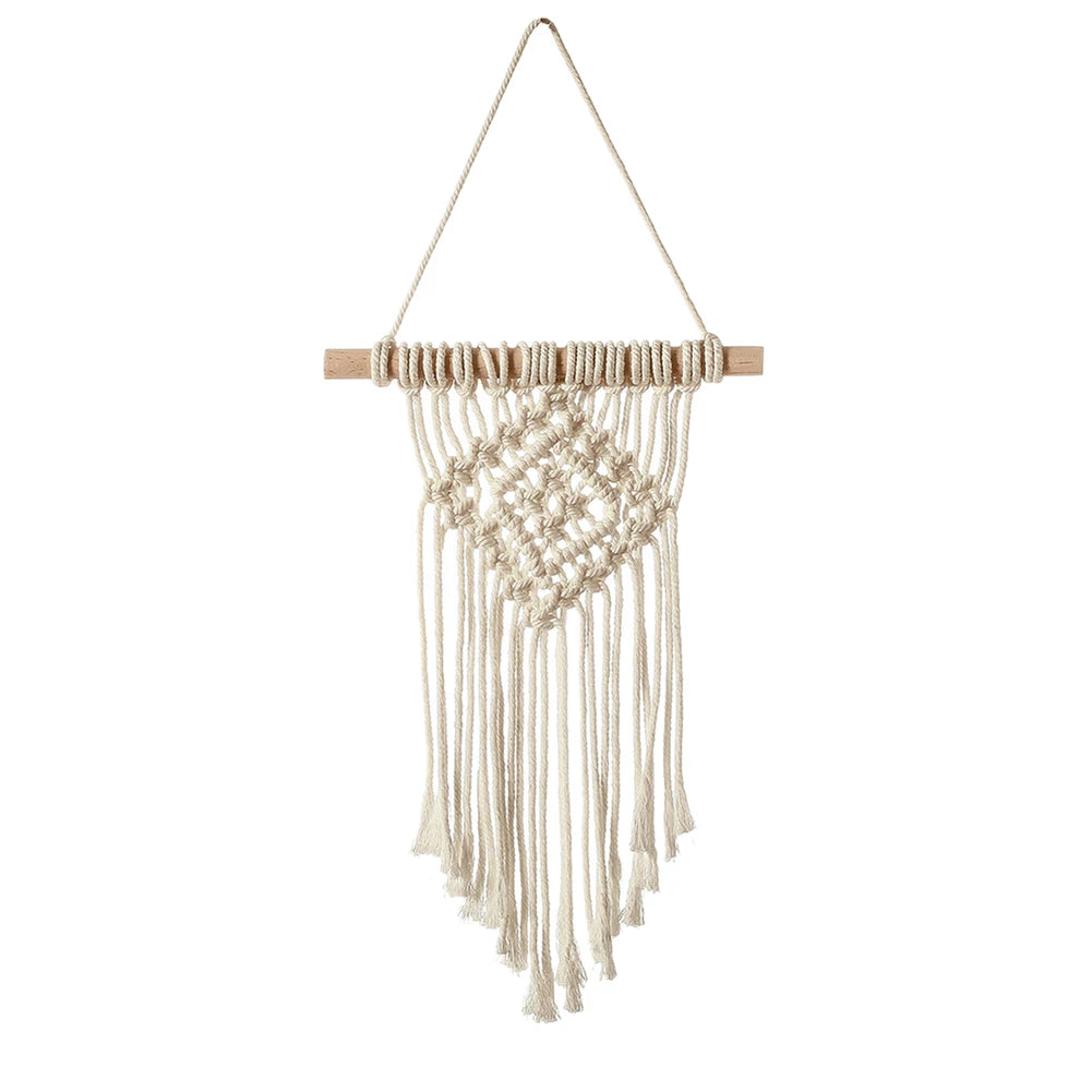 Macrame wall hanging with wooden frame on a white background